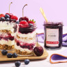 Confiture de cassis Albert Ménès sur une table de petit-déjeuner, tartinée sur un pain grillé