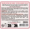 Détail de l'étiquette et de la texture de la Gelée Extra de Coing, recette exclusive au goût acidulé Albert Ménès.